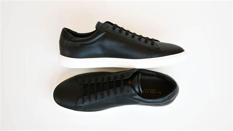 dress shoes with sneaker bottoms.